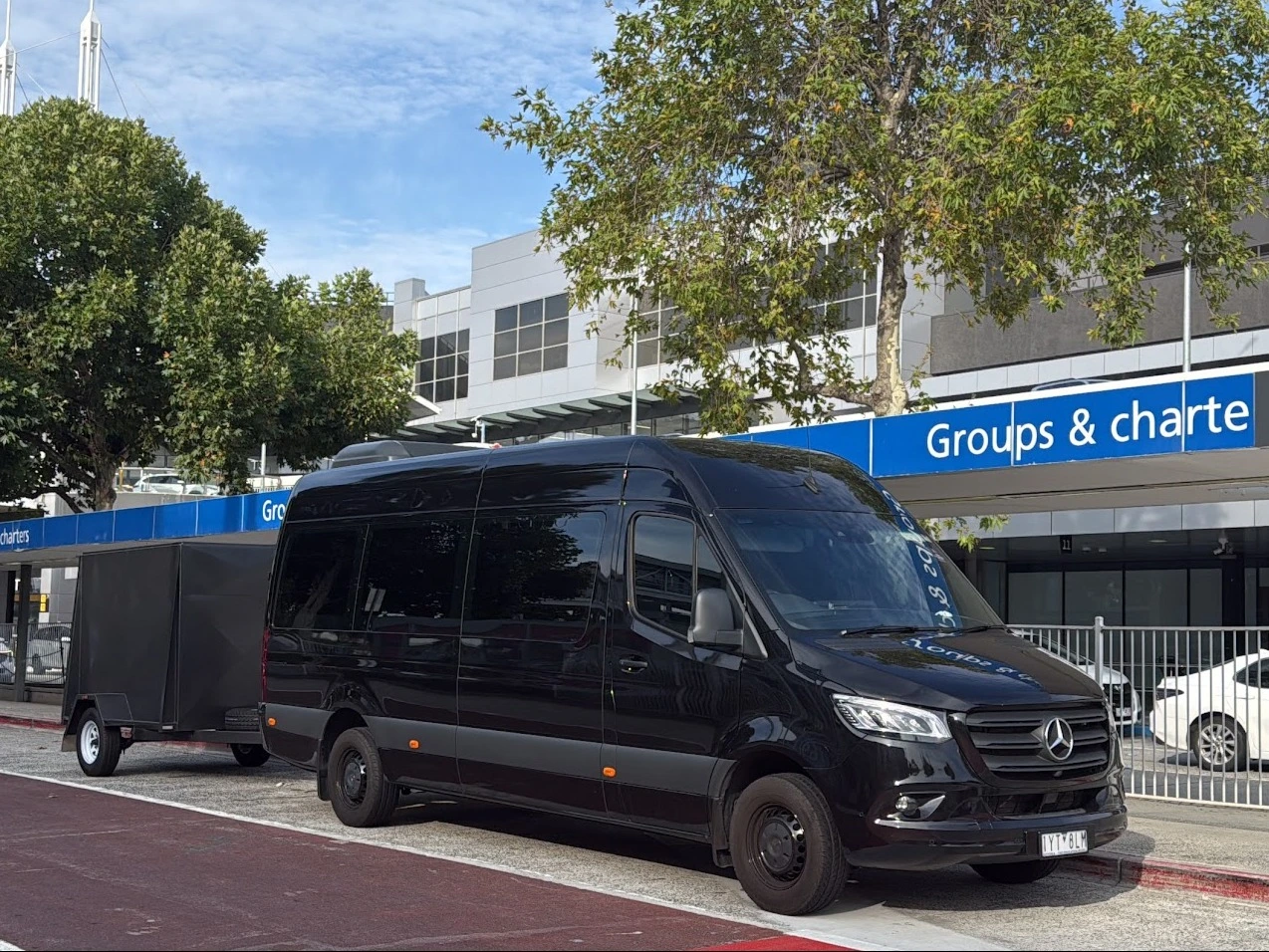 LimoStar Mercedes Sprinter with enclosed luggage trailer